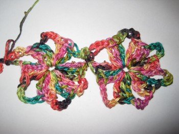 My swatch of Kristin Omdahl's Radiance Scarf from "Seamless Crochet" using a 5.5 mm hook