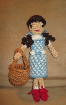 Dorothy with Toto's basket.